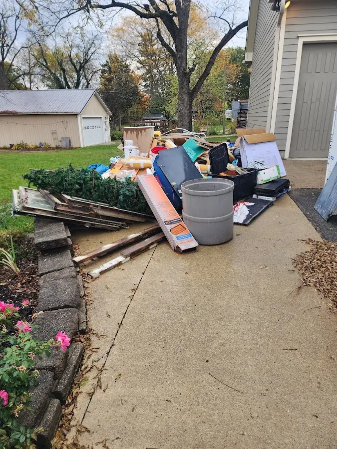 Dumpster being loaded with debris for Commercial Dumpster Rental in Steubenville